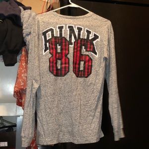 Pink. Long sleeve shirt (says S, would fit M)